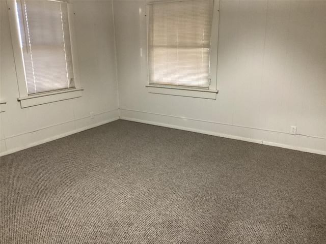 604 S Seaman St, Eastland, TX 76448 - carpeted spare room with baseboards