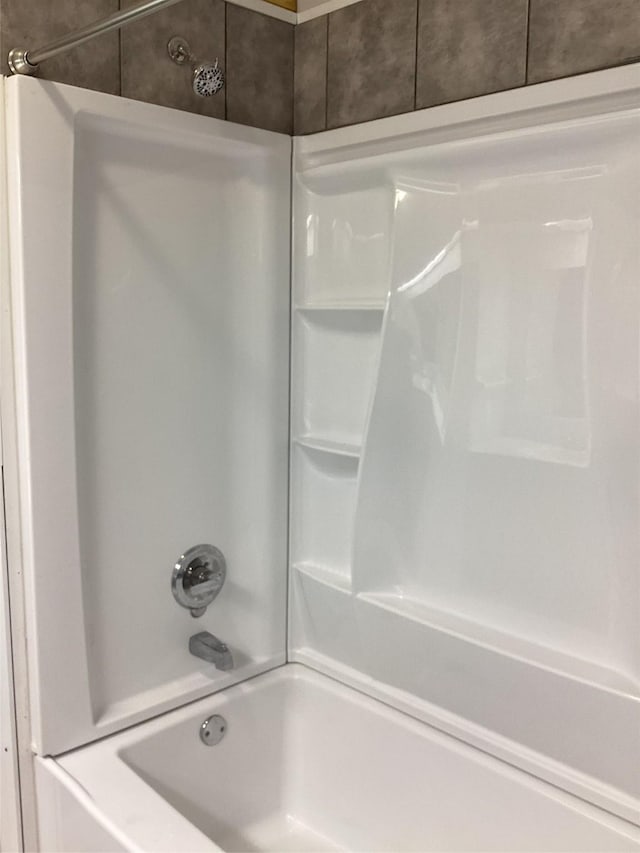 604 S Seaman St, Eastland, TX 76448 - bathroom featuring shower / washtub combination