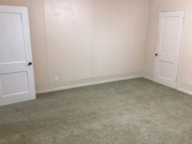 604 S Seaman St, Eastland, TX 76448 - carpeted empty room with baseboards