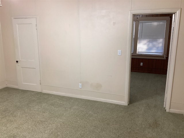 unfurnished room with carpet