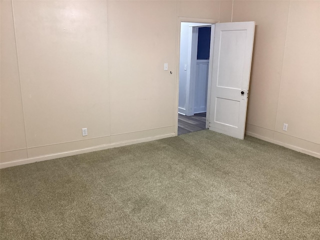 604 S Seaman St, Eastland, TX 76448 - carpeted spare room featuring baseboards