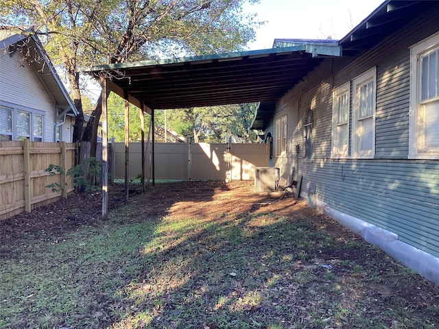 604 S Seaman St, Eastland, TX 76448 - fenced backyard with a carport