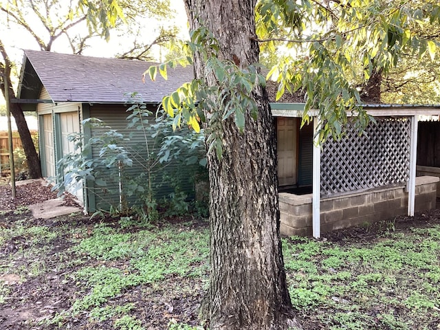 604 S Seaman St, Eastland, TX 76448 - view of property exterior with a shingled roof