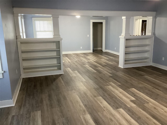 604 S Seaman St, Eastland, TX 76448 - below grade area with baseboards and dark wood finished floors