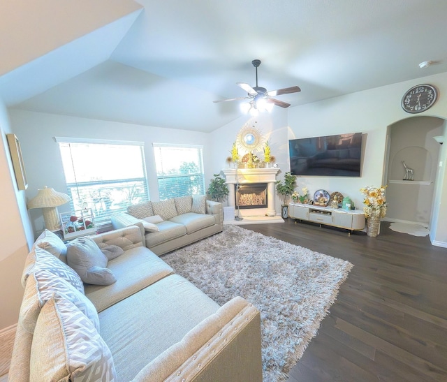 carpeted bedroom with ceiling fan and lofted ceiling