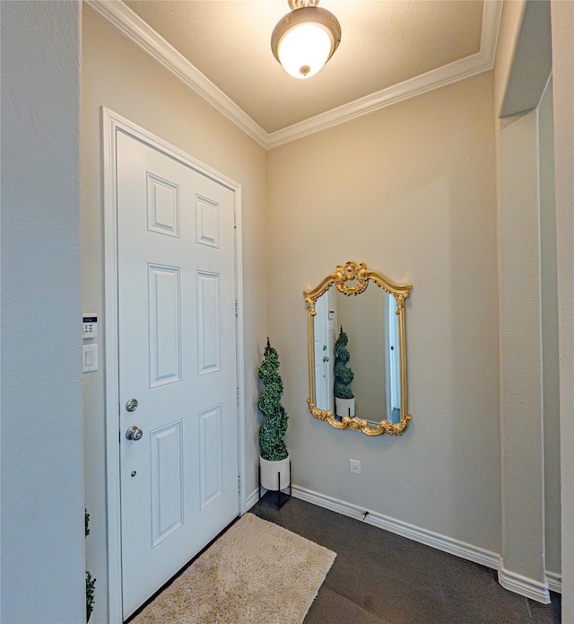 doorway to outside featuring a textured ceiling, dark hardwood / wood-style floors, and ornamental molding