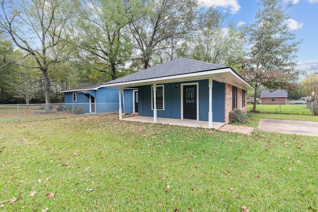 ranch-style house with a front yard