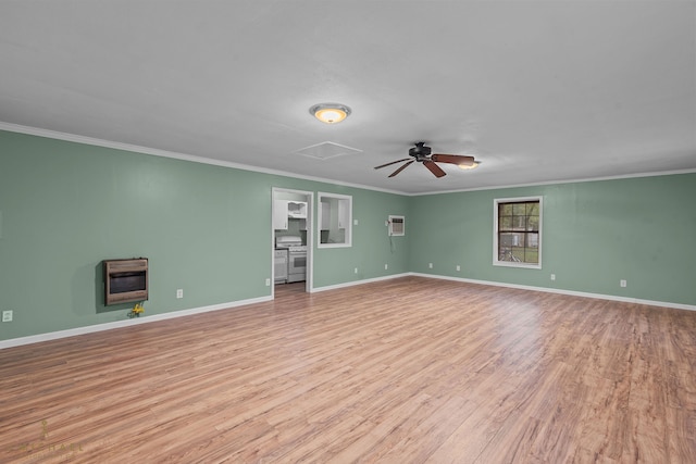 unfurnished room featuring ornamental molding, light hardwood / wood-style floors, ceiling fan, and heating unit