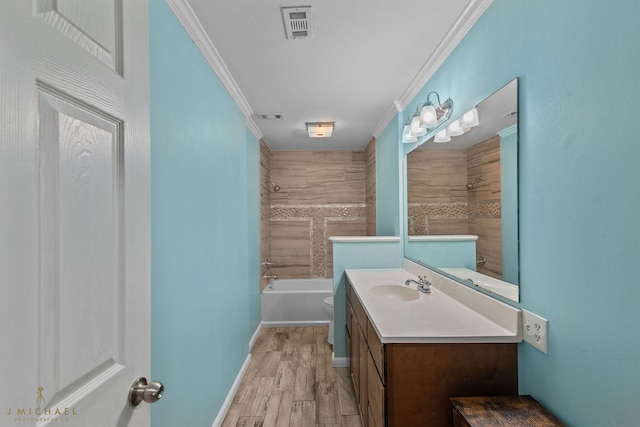 full bathroom with ornamental molding, wood-type flooring, toilet, and vanity