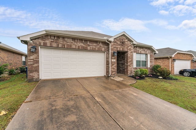 ranch-style home featuring a front lawn and a garage