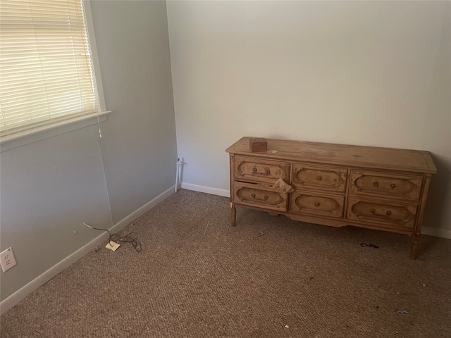 unfurnished bedroom featuring light colored carpet