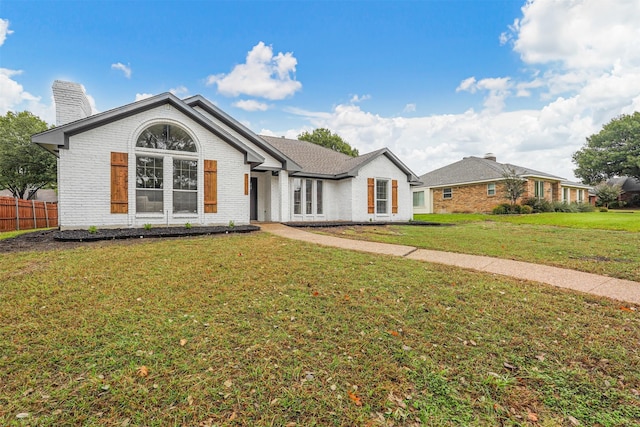 view of front of home featuring a front lawn