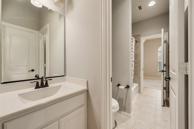 full bathroom with toilet, shower / bath combo, vanity, and tile patterned flooring