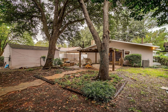 rear view of property with a patio and french doors