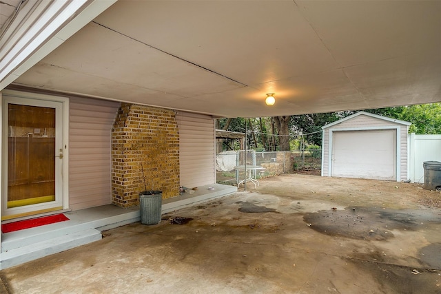 exterior space featuring a garage and an outdoor structure