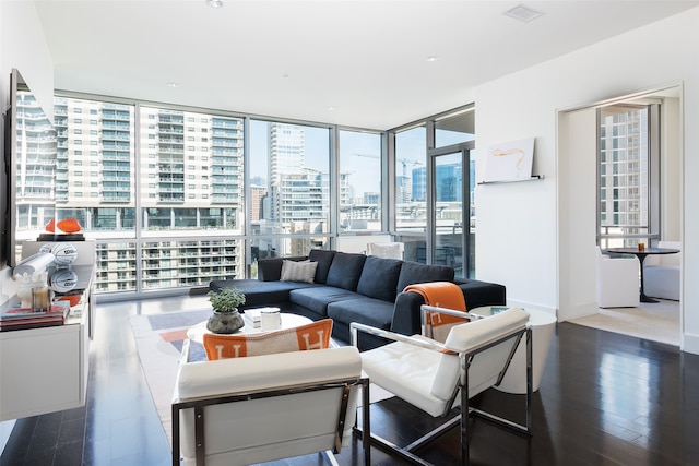 living room with expansive windows and dark hardwood / wood-style flooring