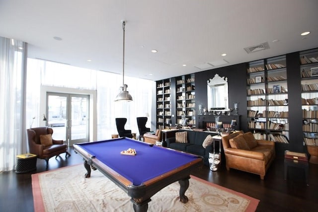 game room featuring hardwood / wood-style flooring, pool table, and french doors