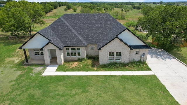 view of front of property with a front lawn