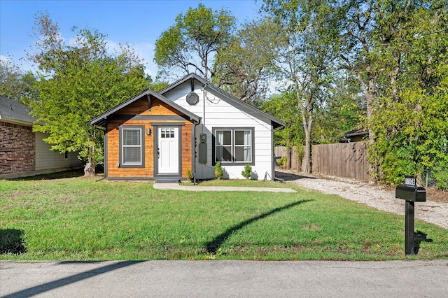 view of front of property with a front lawn