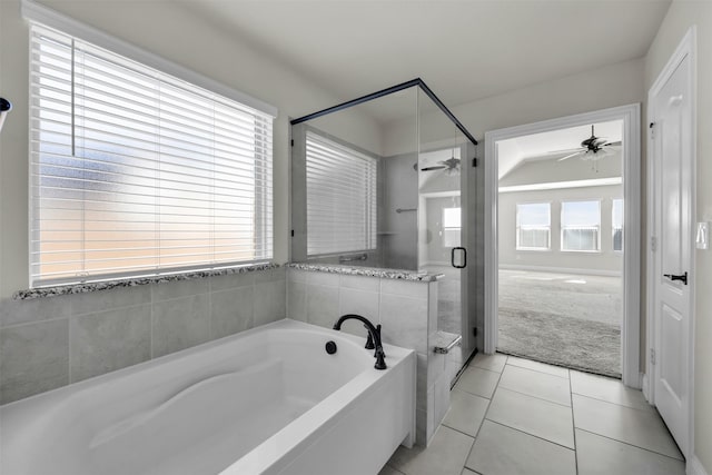 203 Half Moon Dr, Waxahachie, TX 75165 - full bath with tile patterned flooring, a shower stall, a ceiling fan, and a garden tub