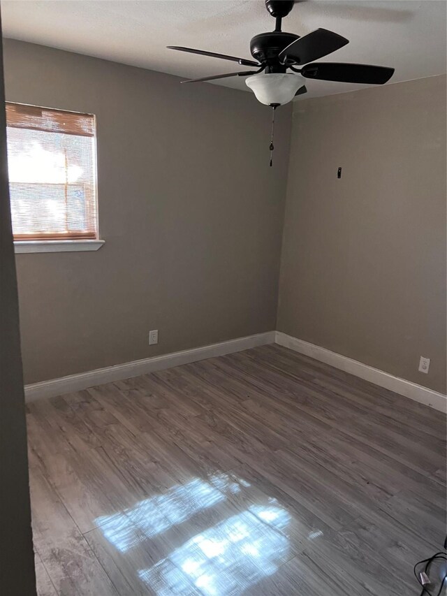 unfurnished room featuring wood-type flooring and ceiling fan