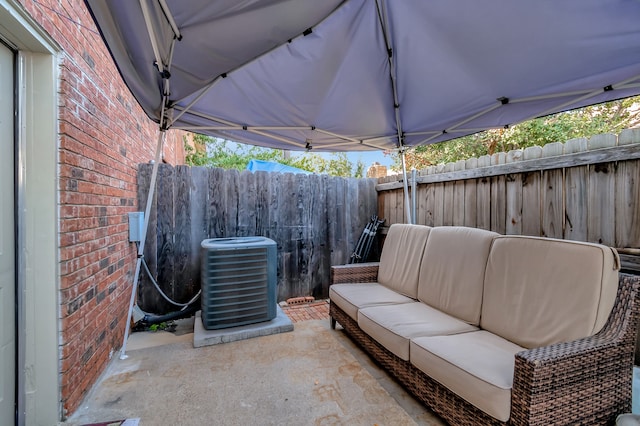 view of patio with central AC