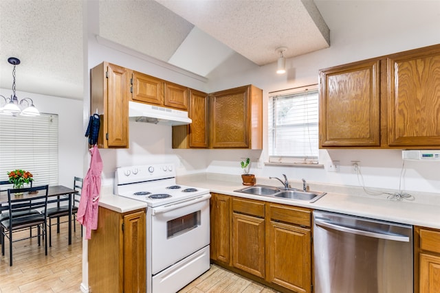 kitchen featuring a textured ceiling, white range with electric cooktop, stainless steel dishwasher, and decorative light fixtures