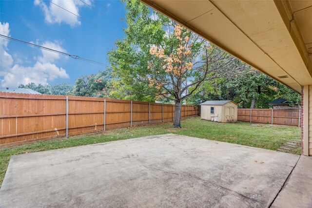 view of patio / terrace featuring a storage shed