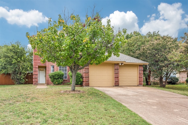 view of front of property with a garage and a front yard