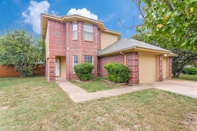 view of front property featuring a garage and a front yard