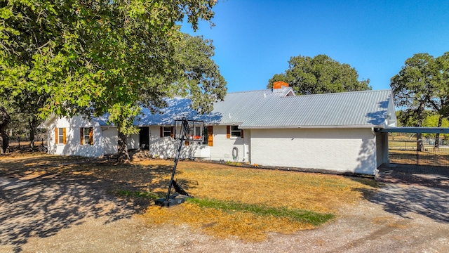 view of front of home featuring a garage and a front lawn