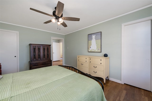 bedroom with ceiling fan, dark hardwood / wood-style flooring, and ornamental molding