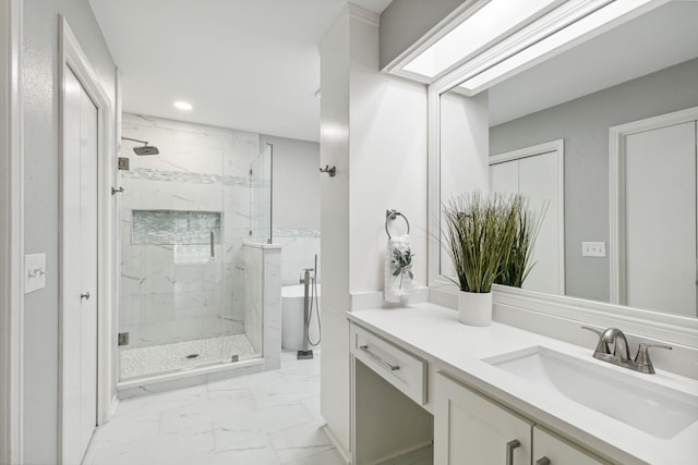 bathroom featuring shower with separate bathtub and vanity