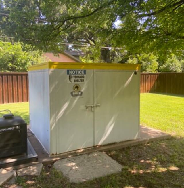 view of outdoor structure with a yard