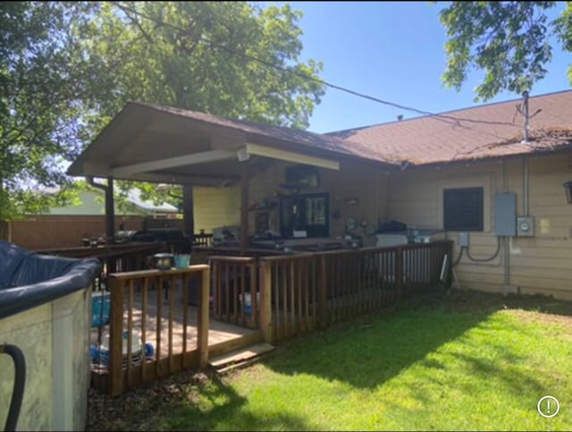 view of yard featuring a wooden deck