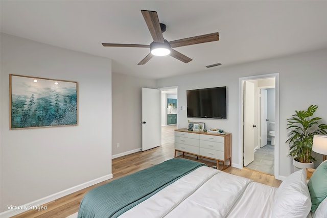 interior space with sink, a notable chandelier, a textured ceiling, and light hardwood / wood-style flooring