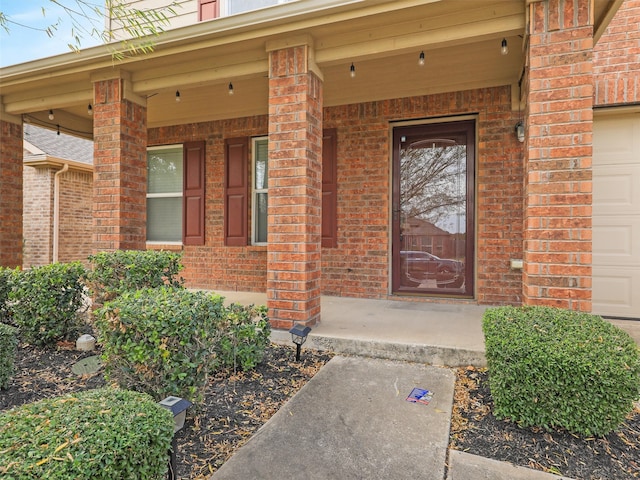 doorway to property with a porch