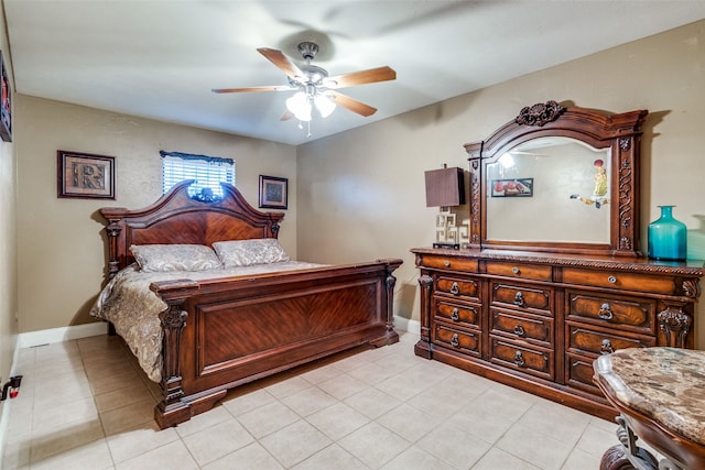 bedroom featuring ceiling fan and light tile patterned floors