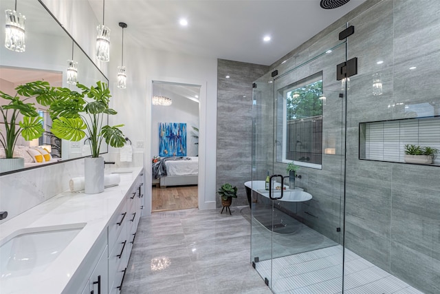 bathroom with vanity, wood-type flooring, and a shower with door