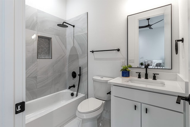 full bathroom with vanity, toilet, and tiled shower / bath