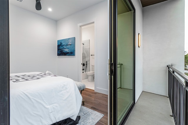 bedroom with connected bathroom, light hardwood / wood-style flooring, and ceiling fan