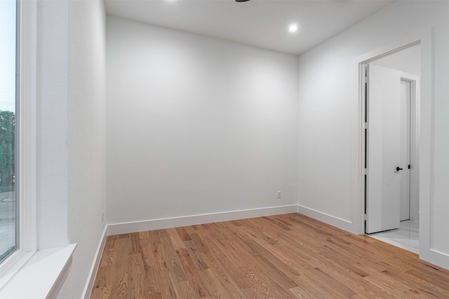 spare room with light hardwood / wood-style floors