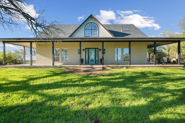 back of house featuring a patio and a yard