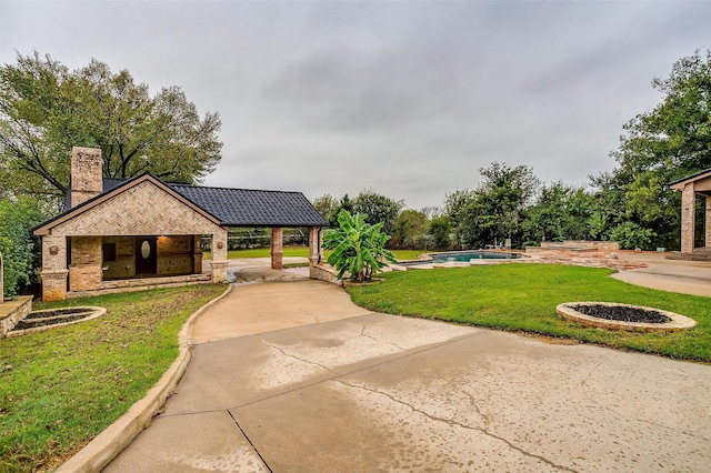 view of home's community with a gazebo, a yard, and a swimming pool