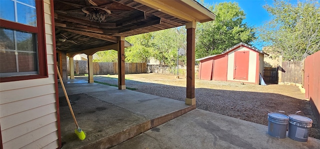 view of patio with a shed