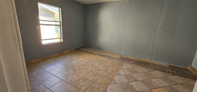 view of tiled empty room