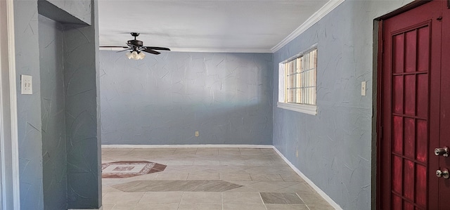 spare room with ceiling fan, light tile patterned floors, and ornamental molding