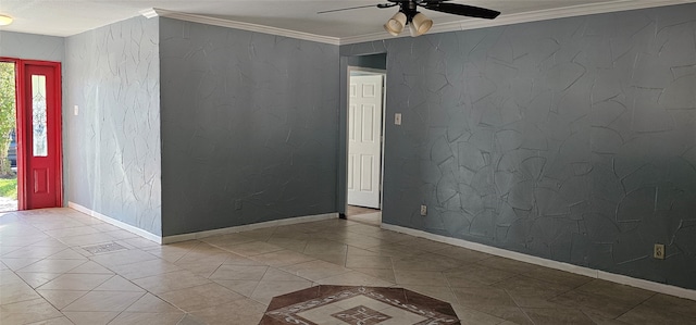 empty room with ceiling fan and crown molding