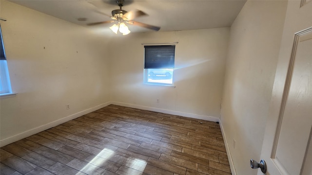 spare room with ceiling fan and hardwood / wood-style floors