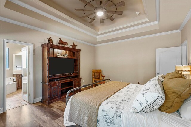 bedroom featuring multiple windows, hardwood / wood-style floors, ceiling fan, and crown molding